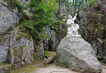 Вяйнямёйнен, играющий на кантеле